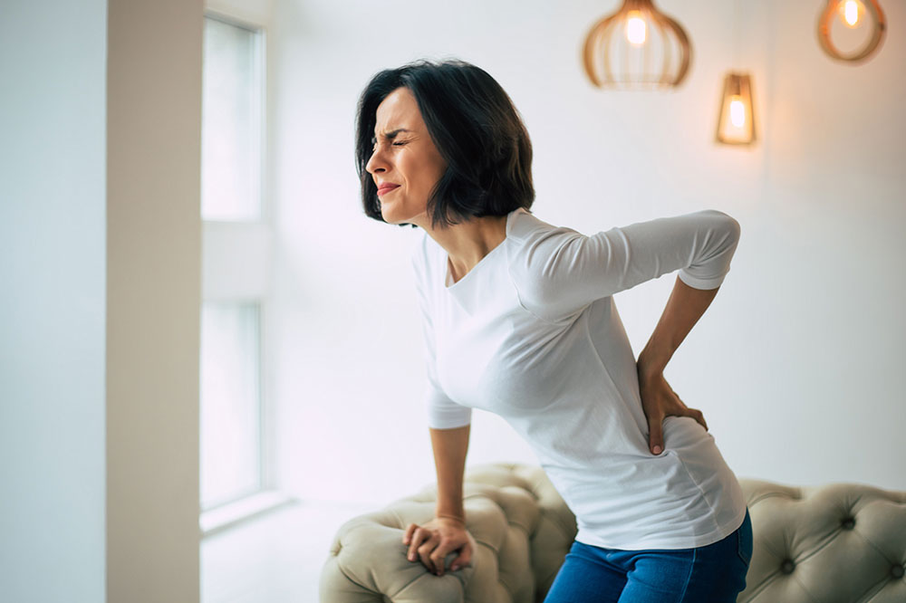 Common causes and symptoms of back pain and how to manage it